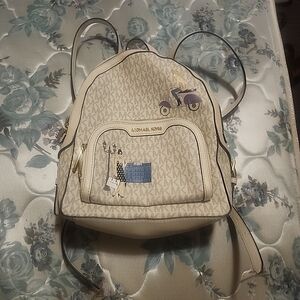 Michael Kors Cream Monogram Backpack with Gold Accents